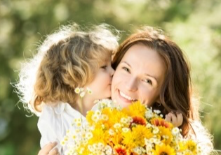 Mom and daughter with flowers
